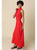 Woman wearing a red dress against a beige background