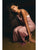 Woman in a sparkly pink dress sitting on a dark background
